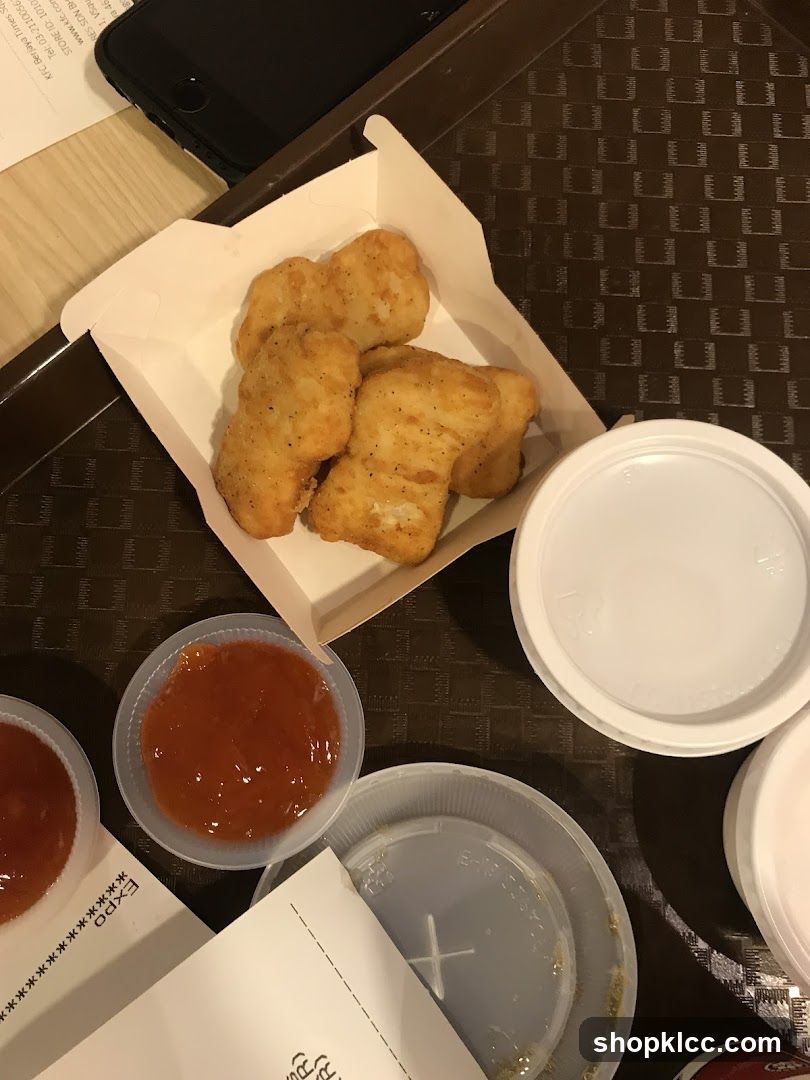 Takeout Meal with Chicken Nuggets and Ketchup