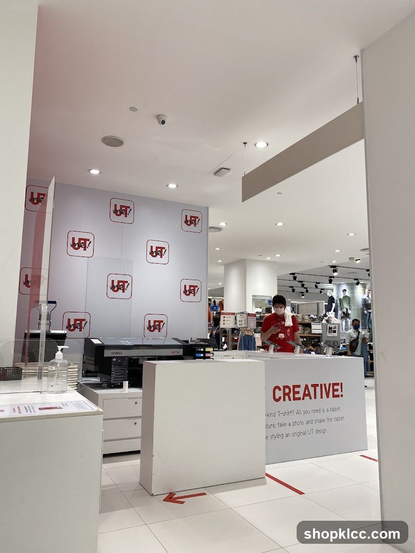 UT Store Interior with Custom Printing Booth