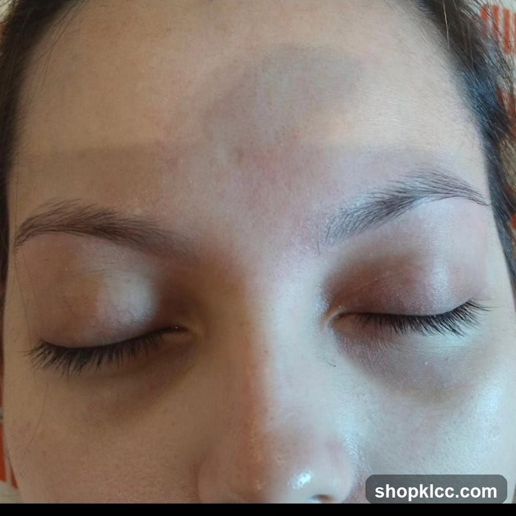 Close-up of a person's face with closed eyes