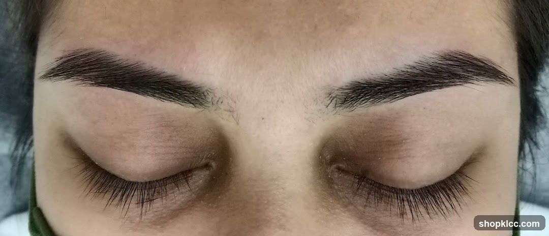 Eyes with closed lids and eyebrows