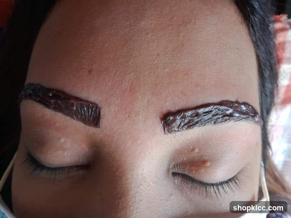 Eyes with eyebrow waxing treatment