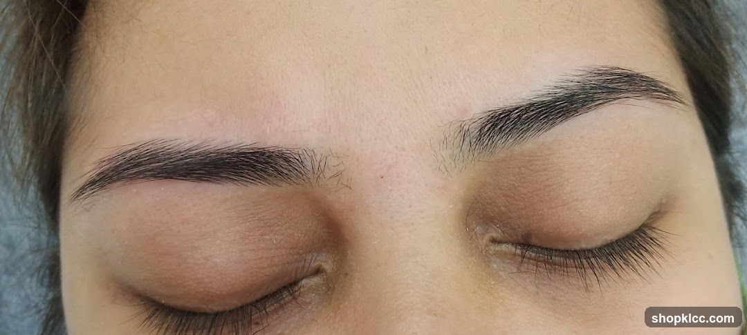 Eyes with closed lids and eyebrows