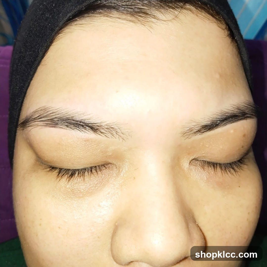 Close-up of a person's face with closed eyes