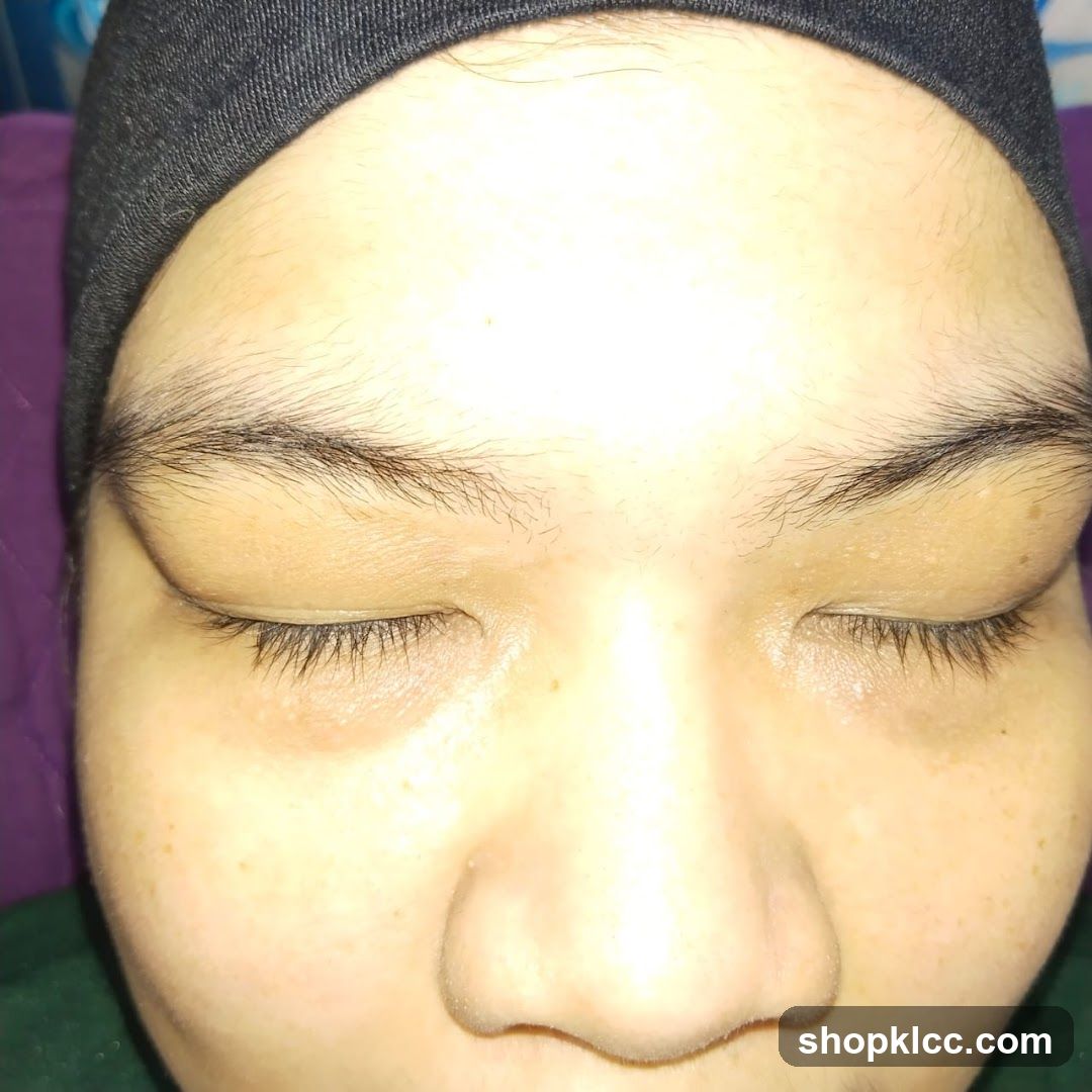 Face with closed eyes and headband