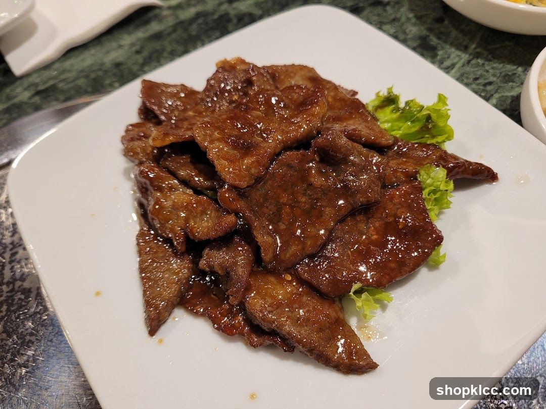 Sauced Beef Slices with Lettuce Garnish