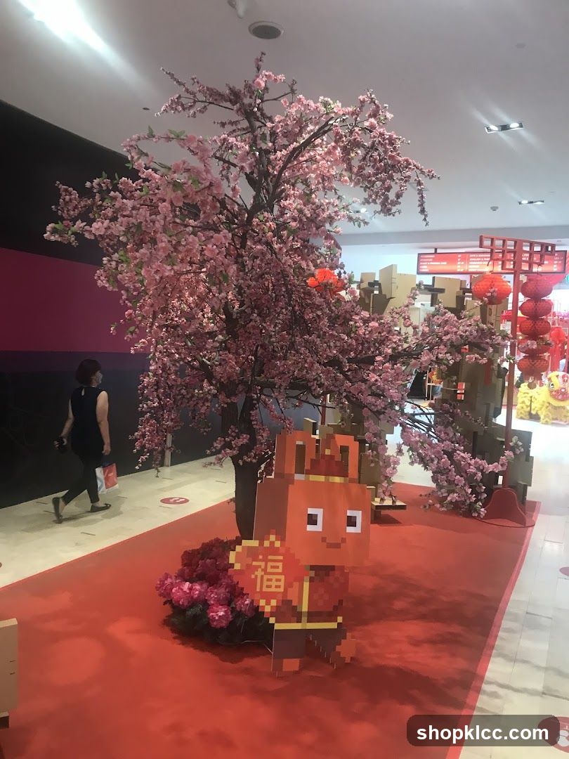 Cherry Blossom Tree Display with Pixel Art Character