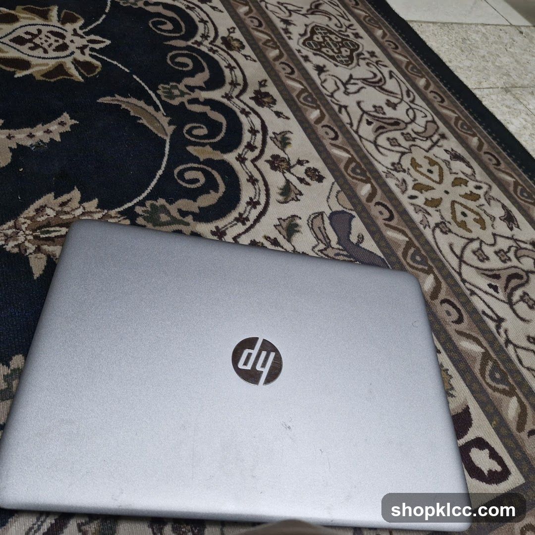 HP Laptop on Rug