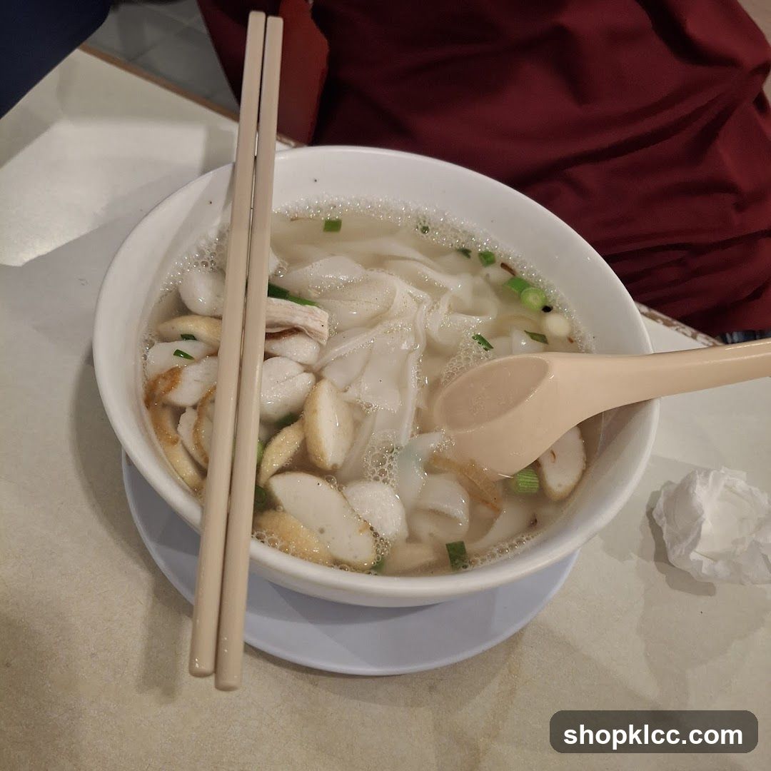 Bowl of Soup with Noodles and Fish Balls