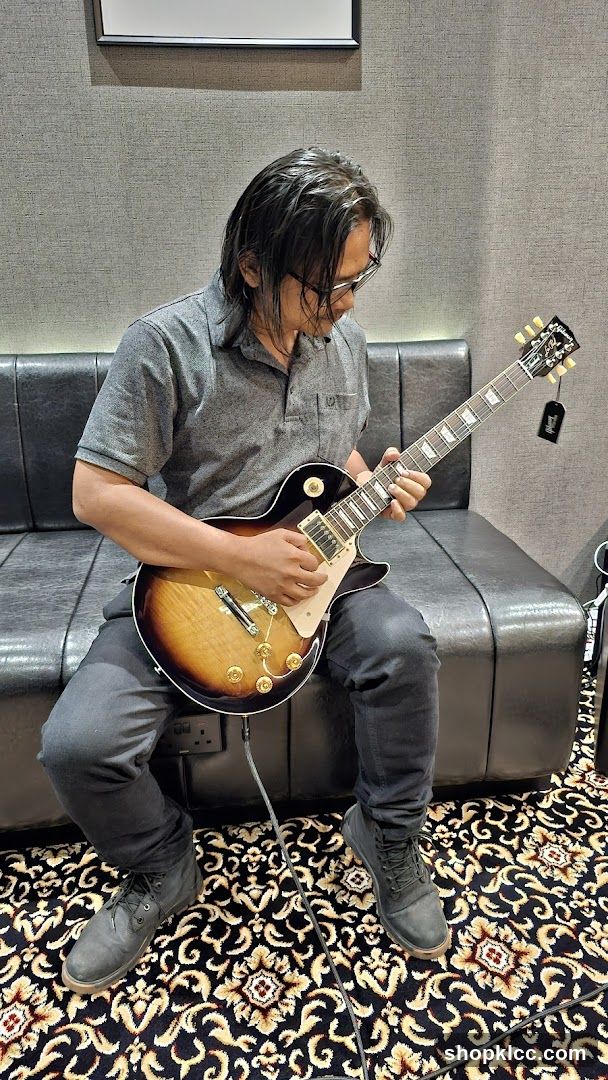 Man playing a guitar