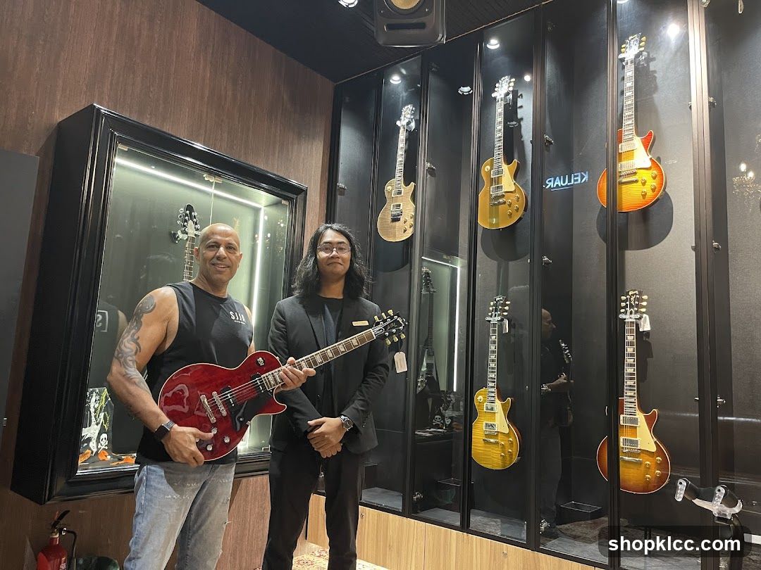 Two men in a guitar shop