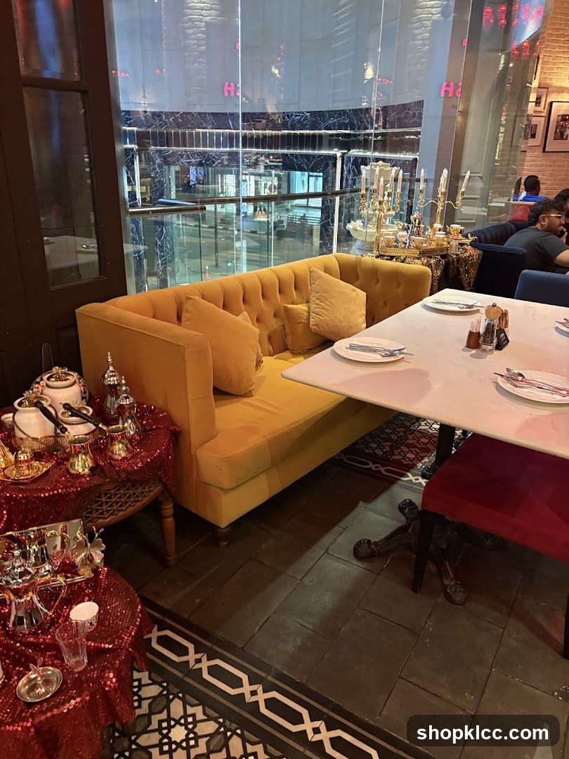 Restaurant Interior with Yellow Sofa and Decorative Table Setting