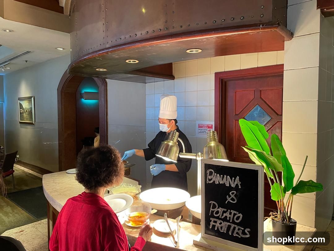 Chef Serving Food at Buffet Station