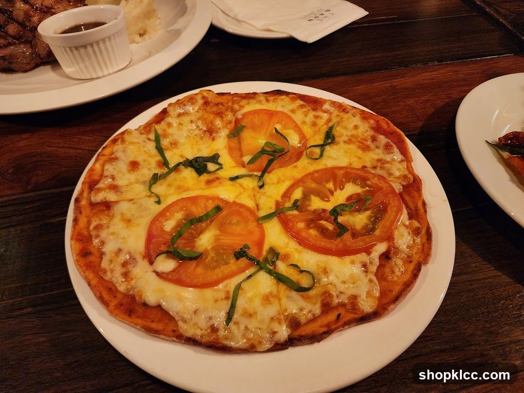 Tomato and Cheese Pizza with Basil