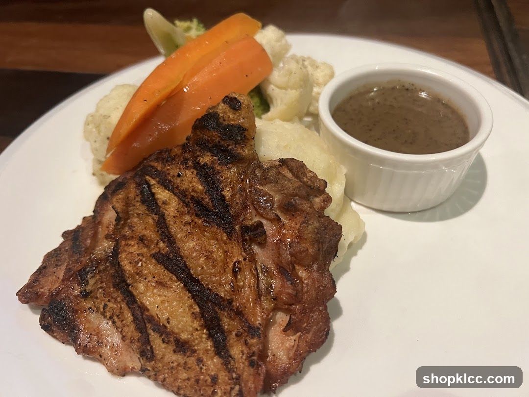 Grilled Pork Chop with Vegetables and Sauce