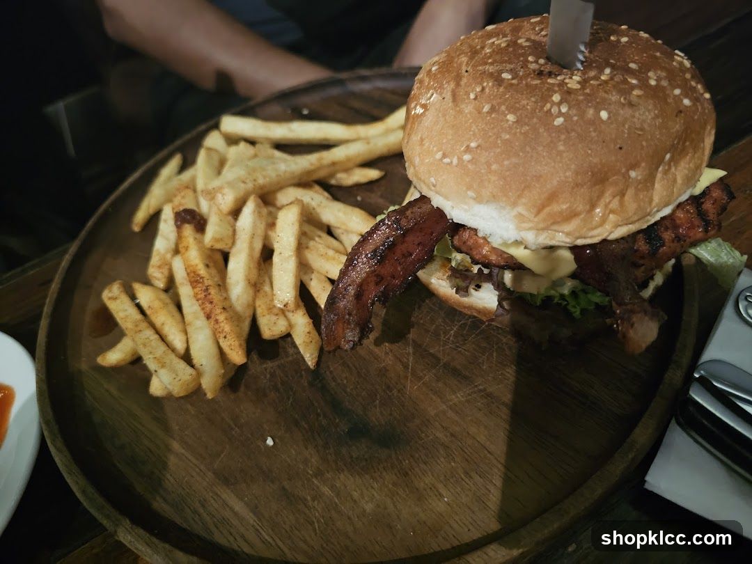Burger and Fries on Wooden Platter