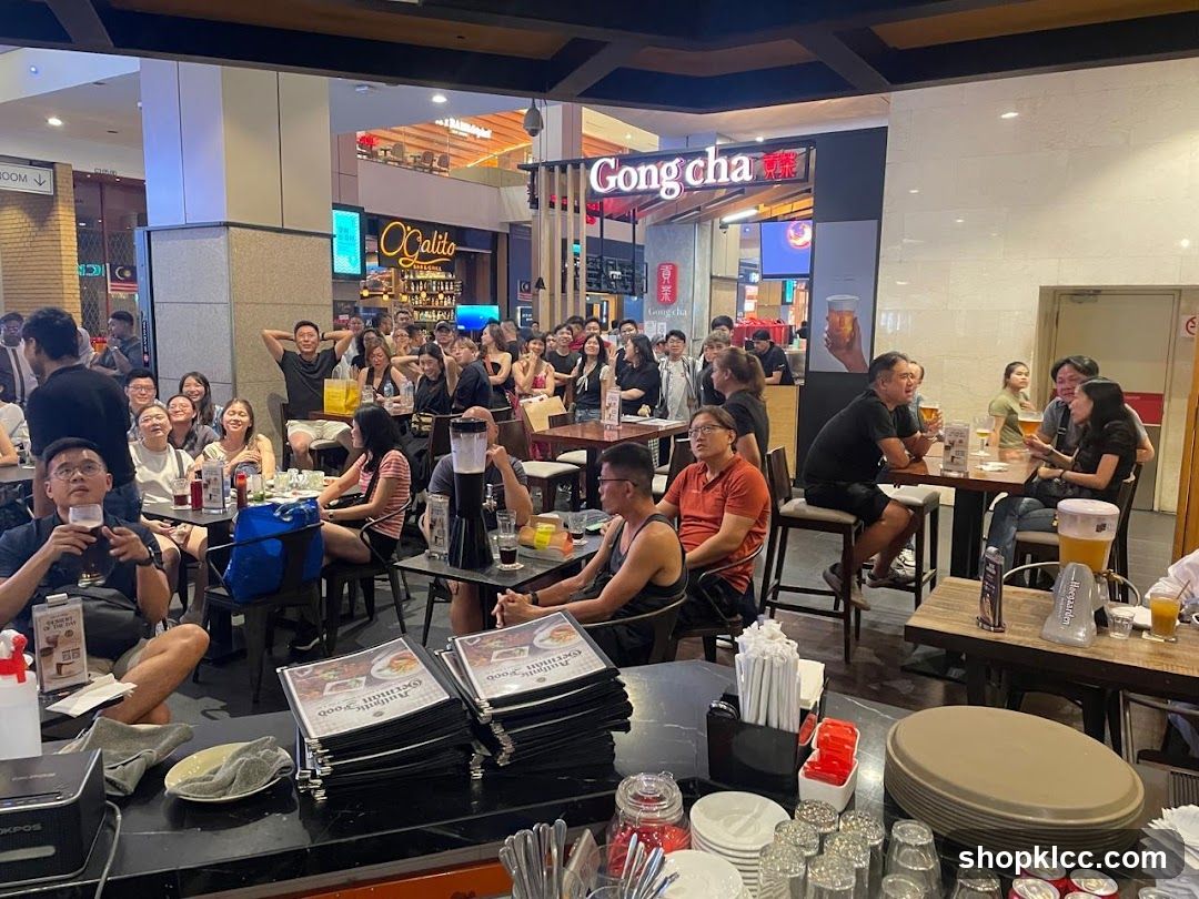 Crowded Dining Area with Menu Stacks