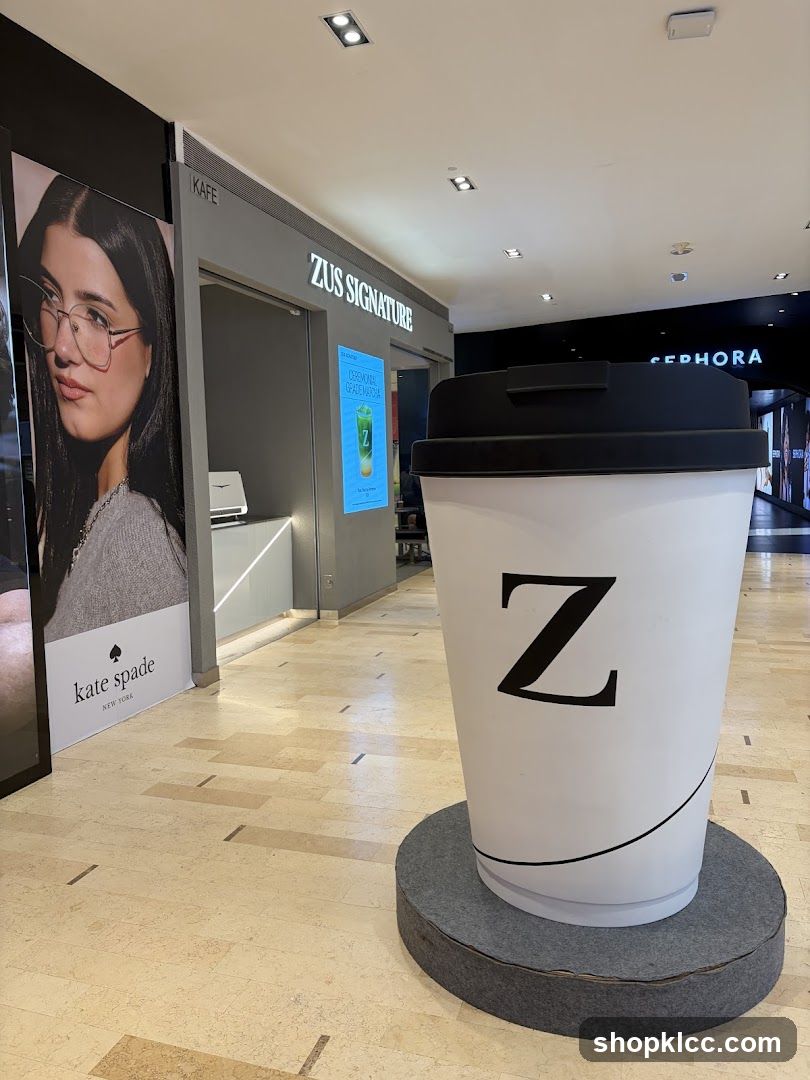 Shopping Mall Interior with Large Coffee Cup Display