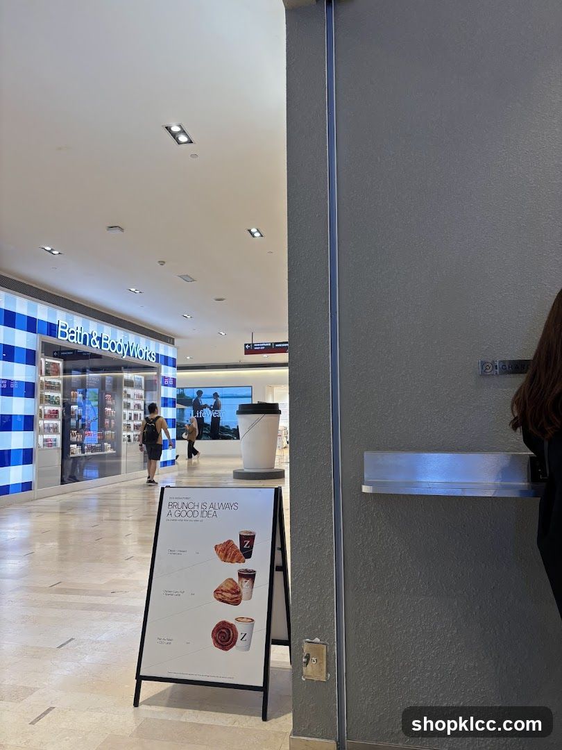 Shopping Mall Interior with Bath & Body Works Storefront