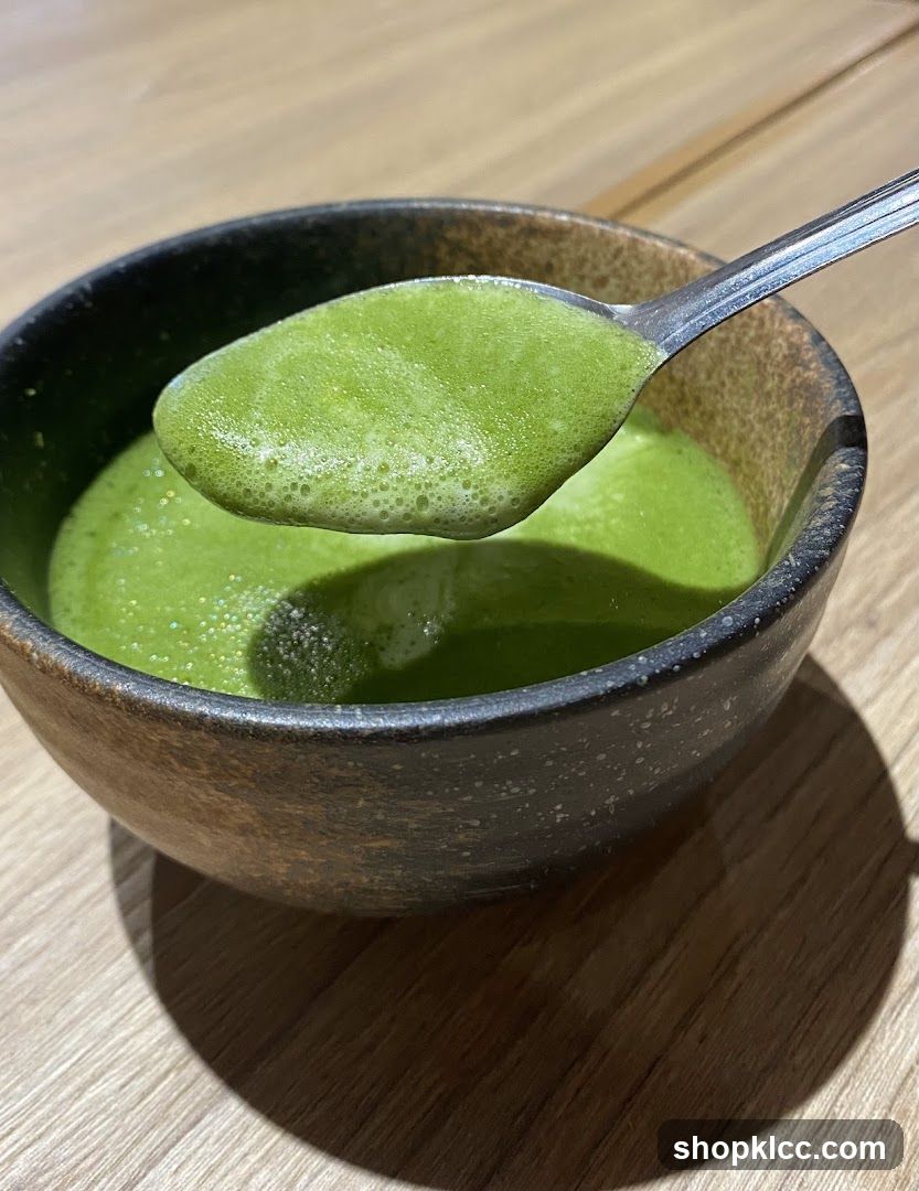 Green Soup on Spoon