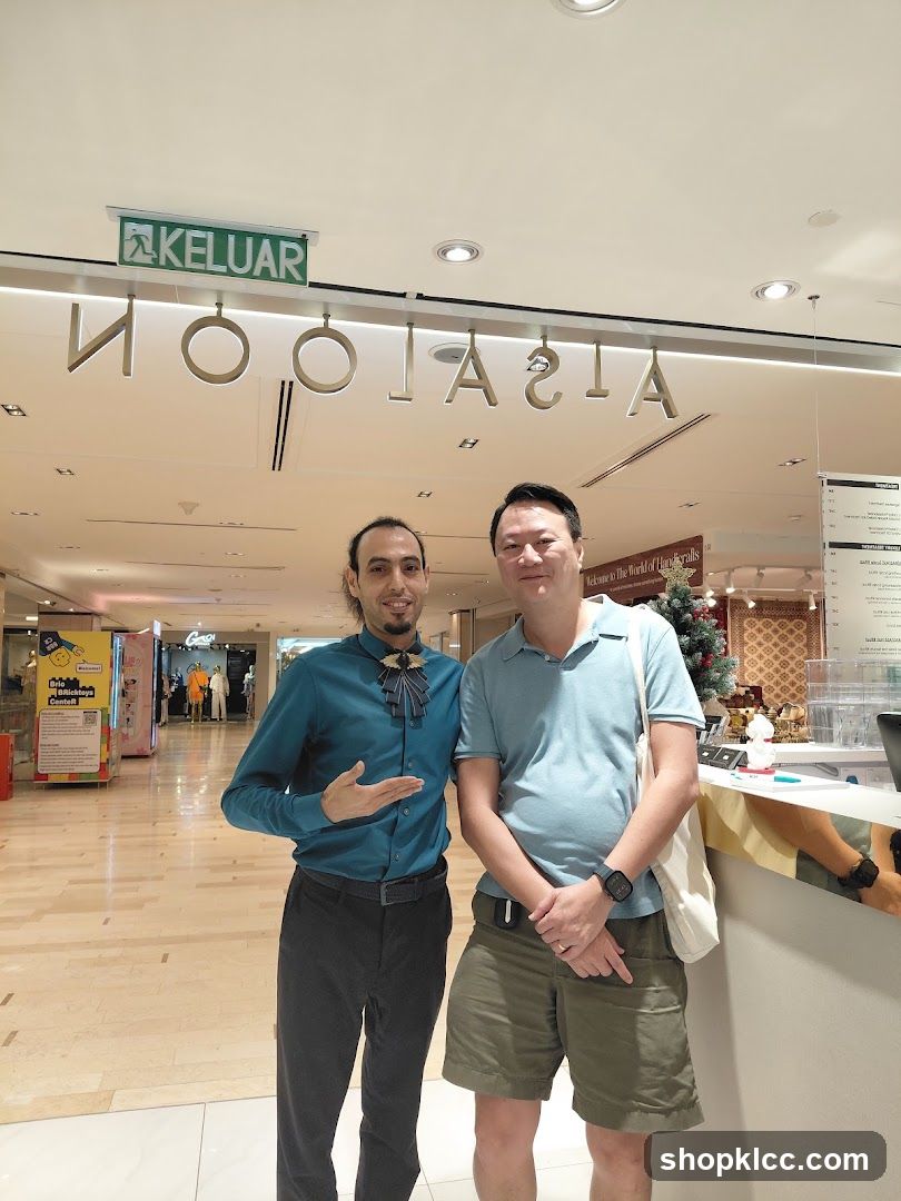 Two men posing in a mall