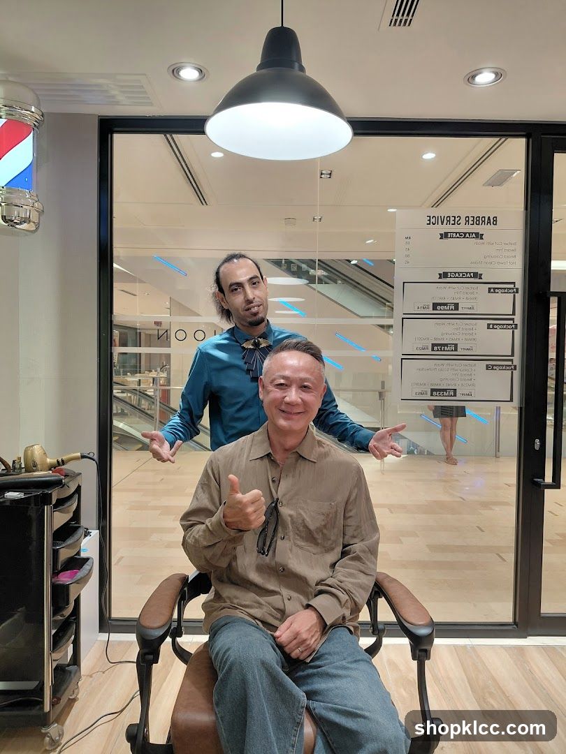 Barber Shop Interior with Staff and Customer