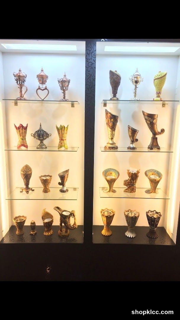 Display of ornate vases and cups