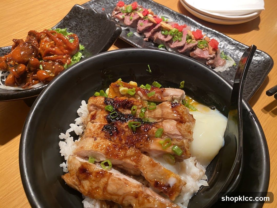 Japanese-style rice bowls with grilled chicken and beef sashimi