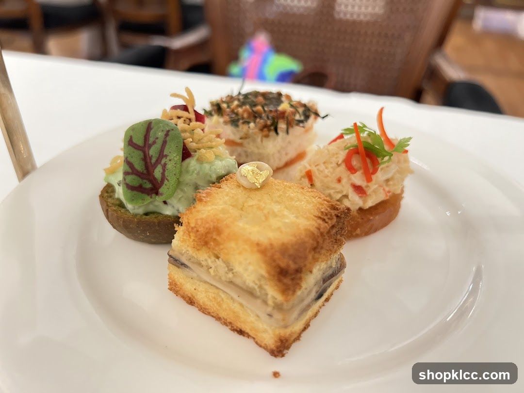 Assorted Canapés on White Plate