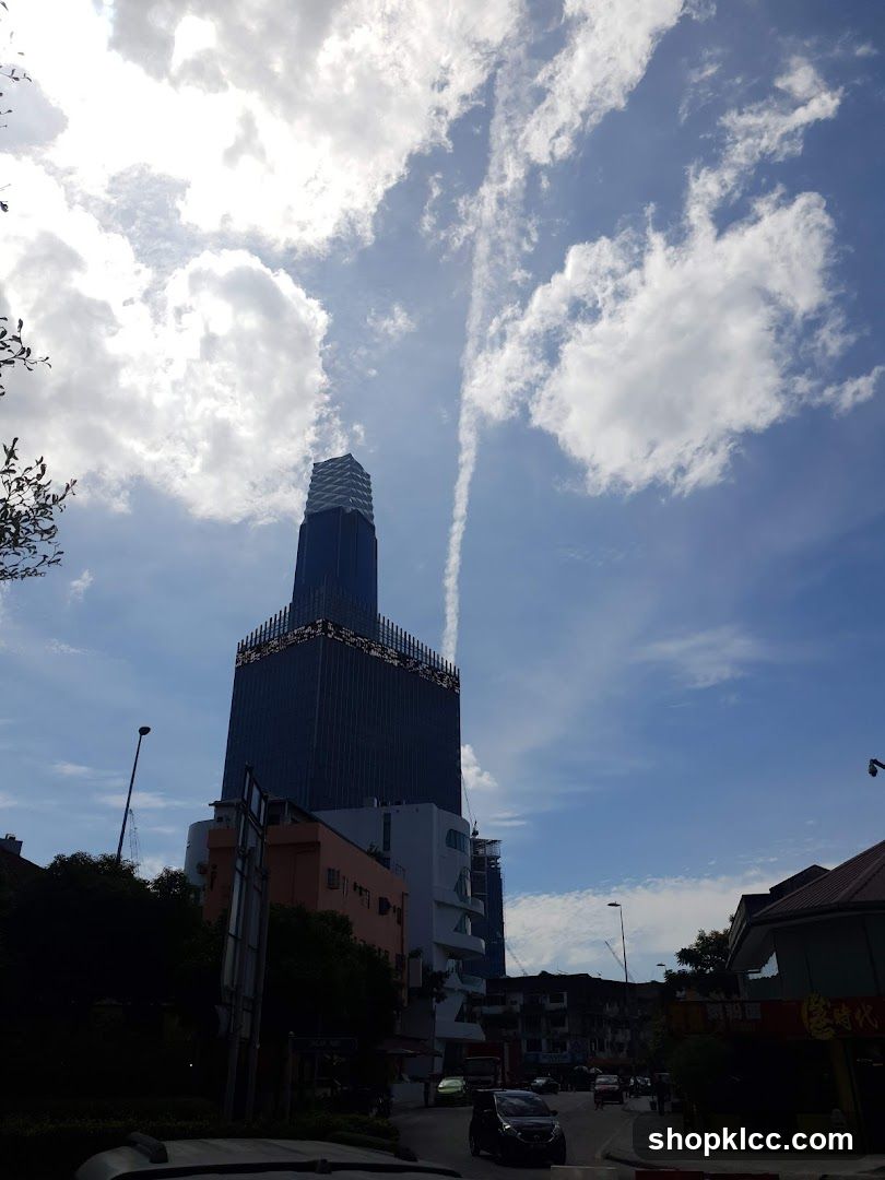 Tall Building with Clouds