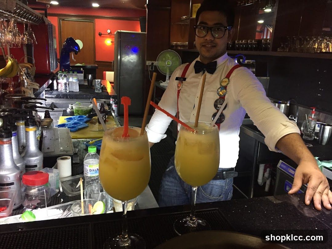 Bartender with drinks
