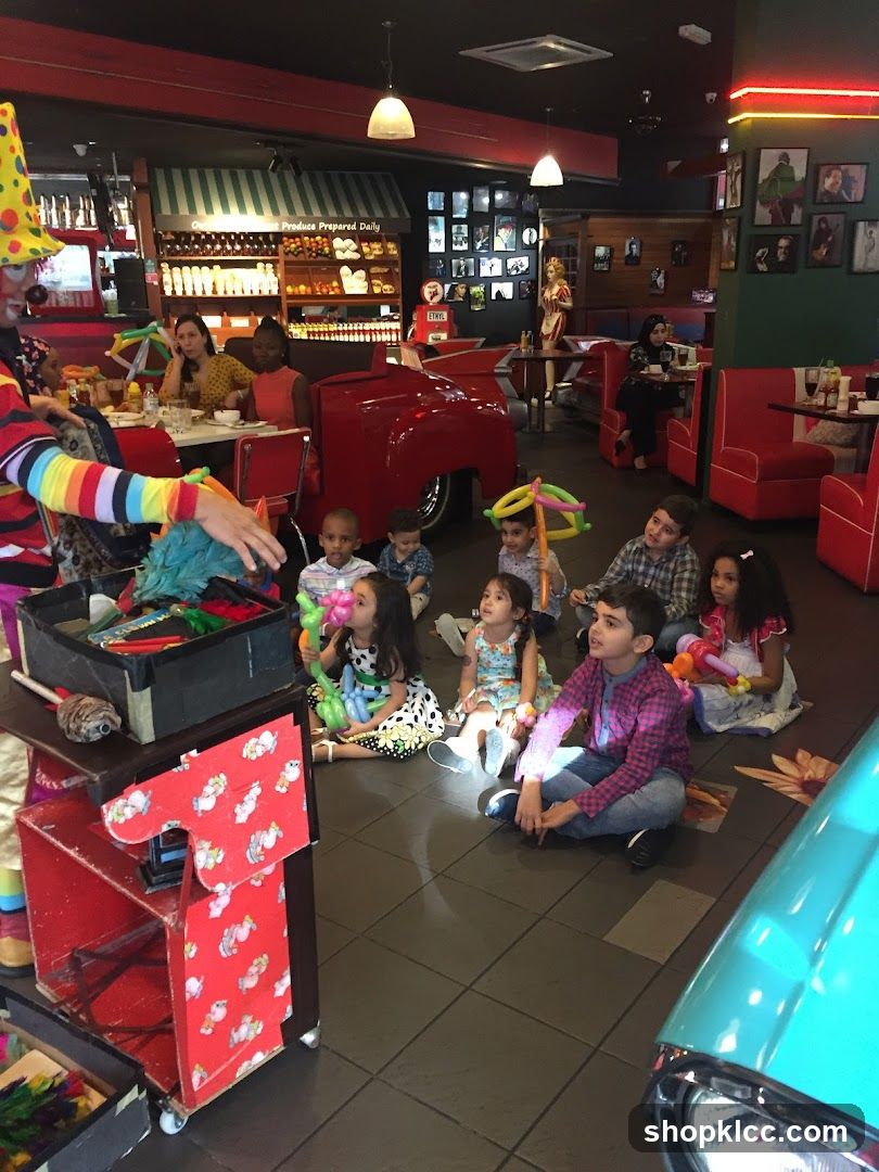 Clown entertaining children at a diner