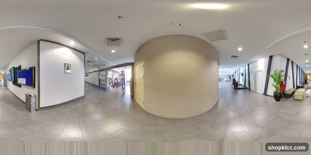 Interior Hallway with Bulletin Boards and Seating Area