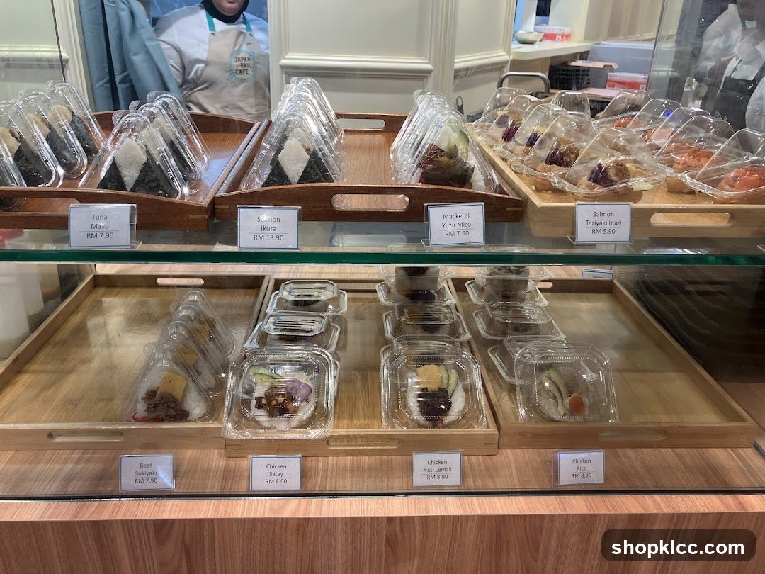 Pre-packaged Japanese food items in a display case