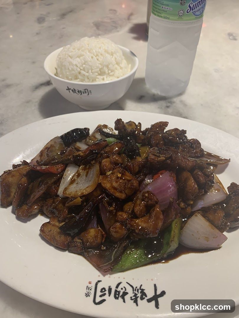 Stir-fried Chicken with Onions and Peppers