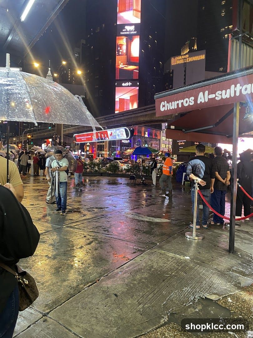 Rainy Night Street Scene with Churros Stand