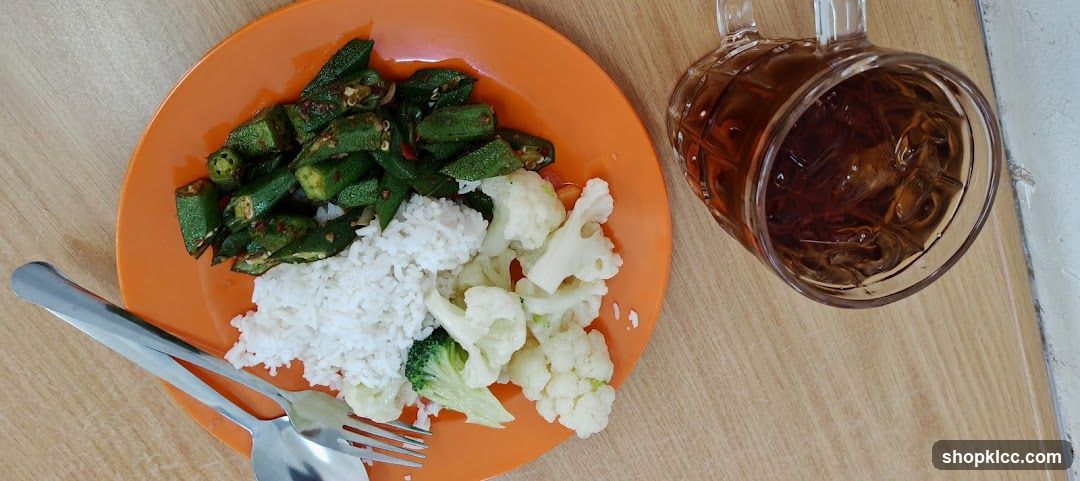 Plate of food with okra, rice and cauliflower