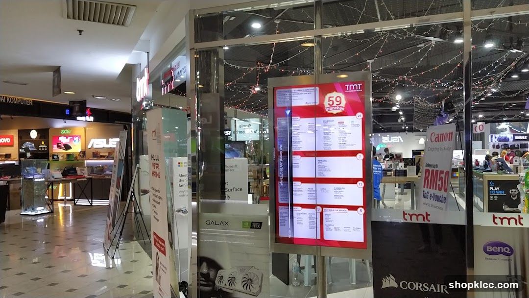 Shopping Mall Interior with Storefronts and Displays