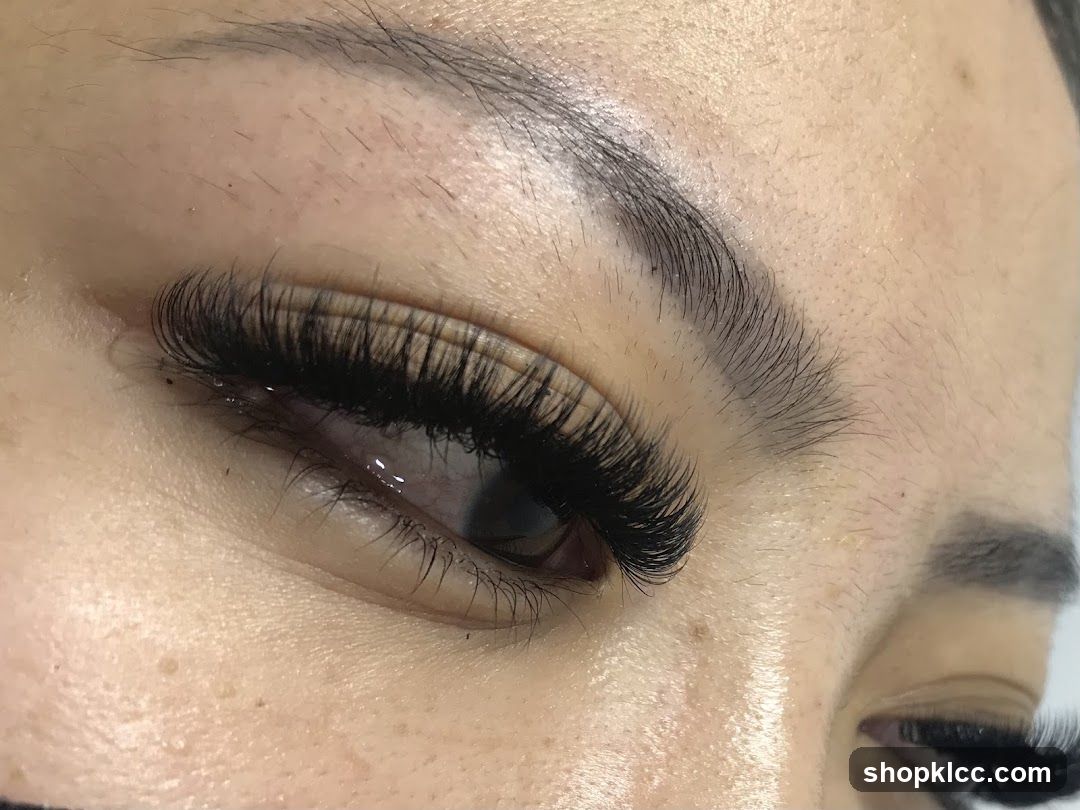 Close-up of an eye with false eyelashes and makeup