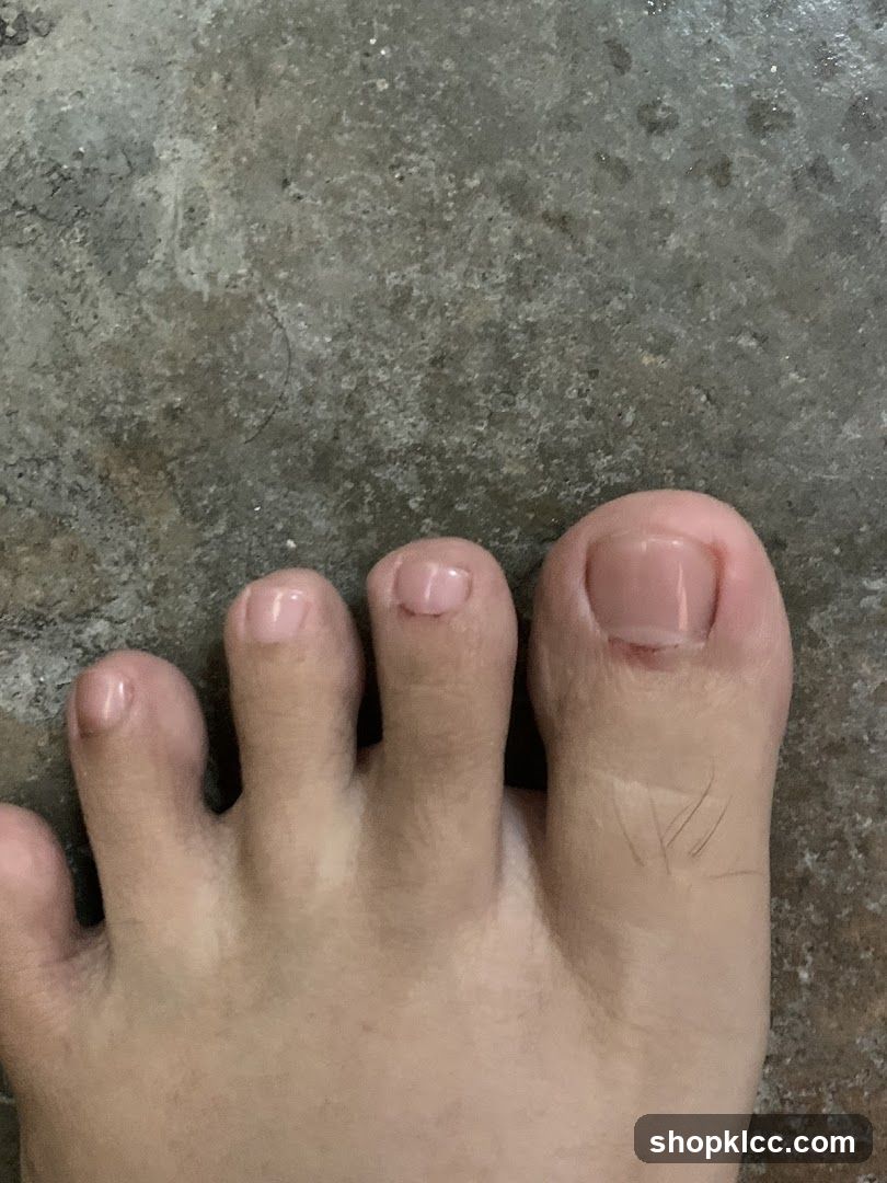 Foot on Concrete Floor