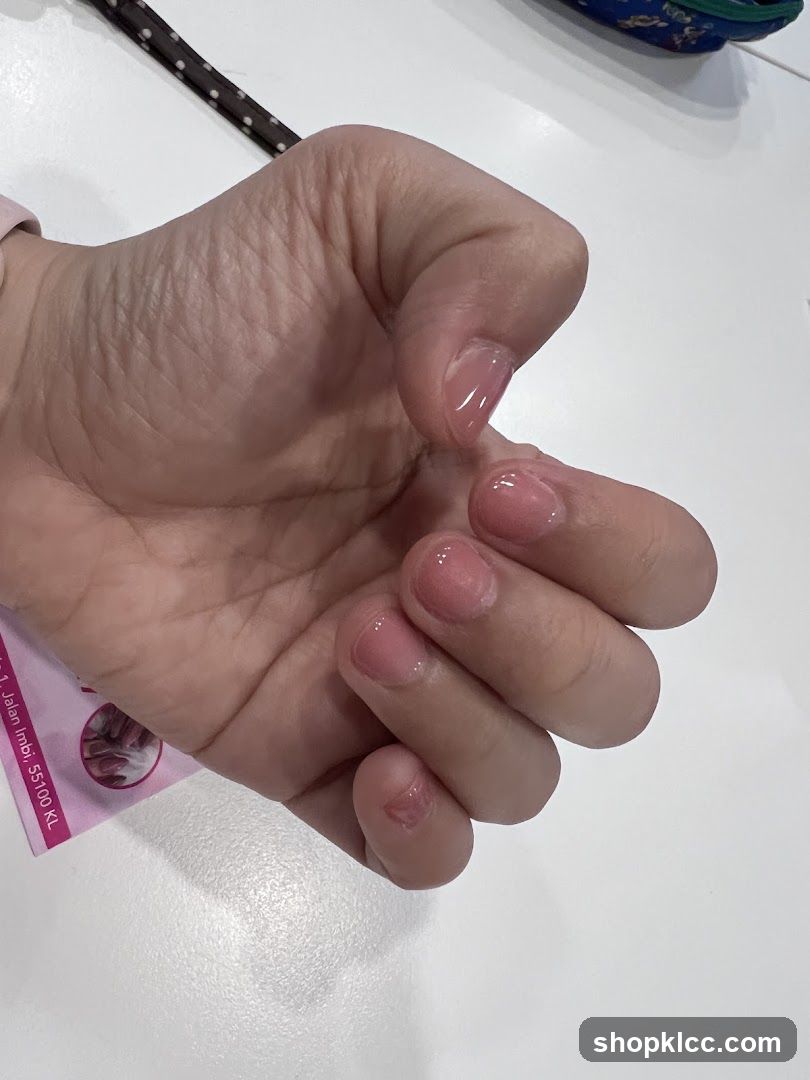 Hand with manicured nails