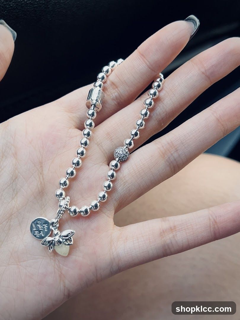 Silver Beaded Bracelet with Butterfly Charm