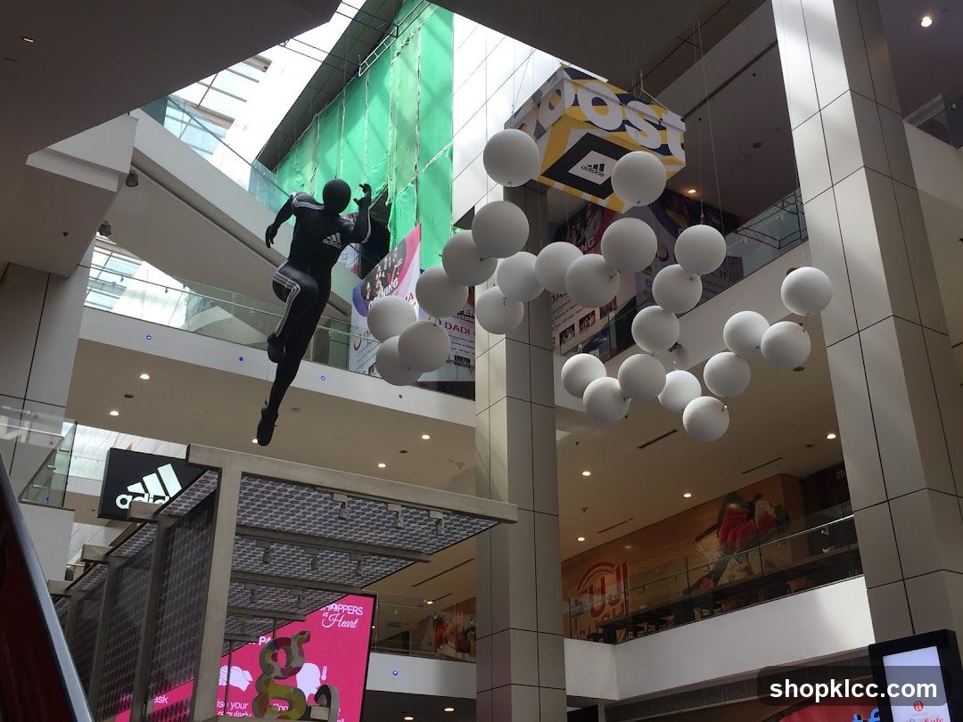 Shopping Mall Interior with Hanging Decorations