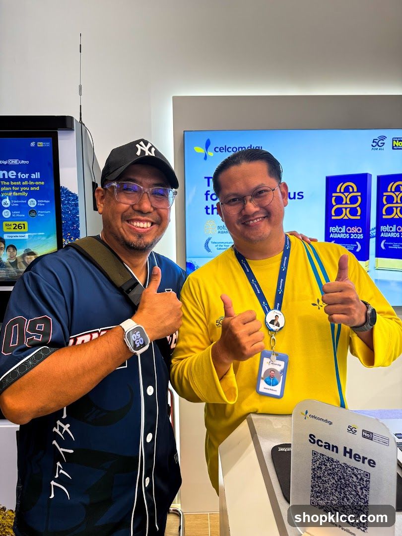 Two men giving thumbs up at a store