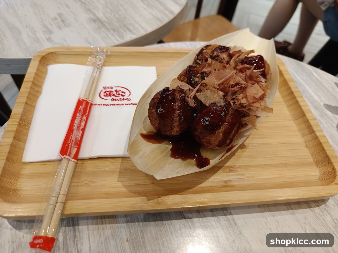 Takoyaki on a wooden tray