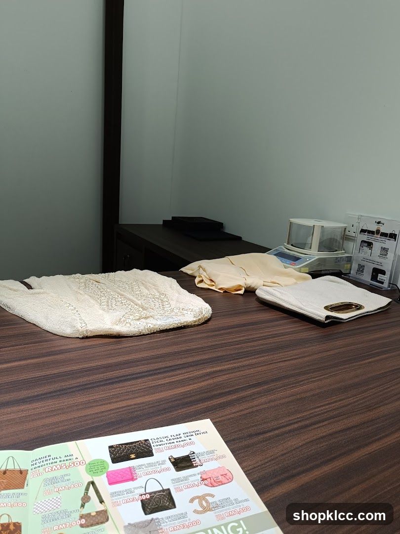 Interior display table with fashion items and catalog