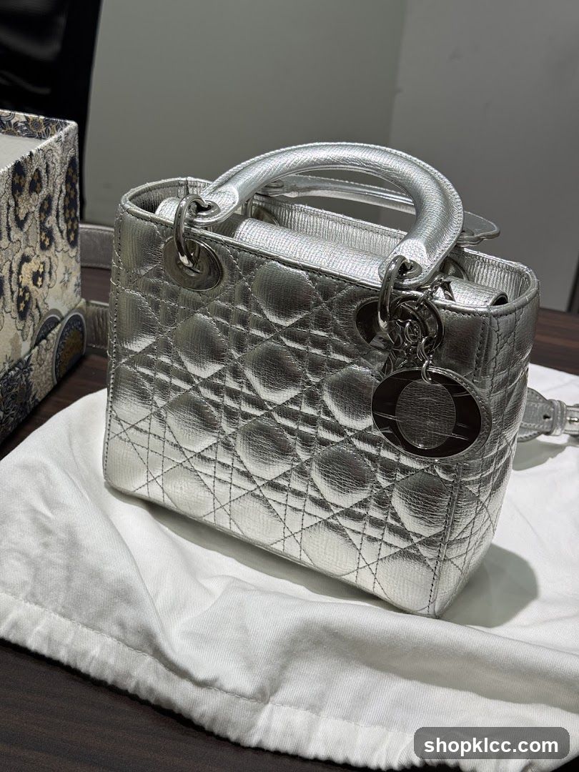 Silver Handbag on White Cloth