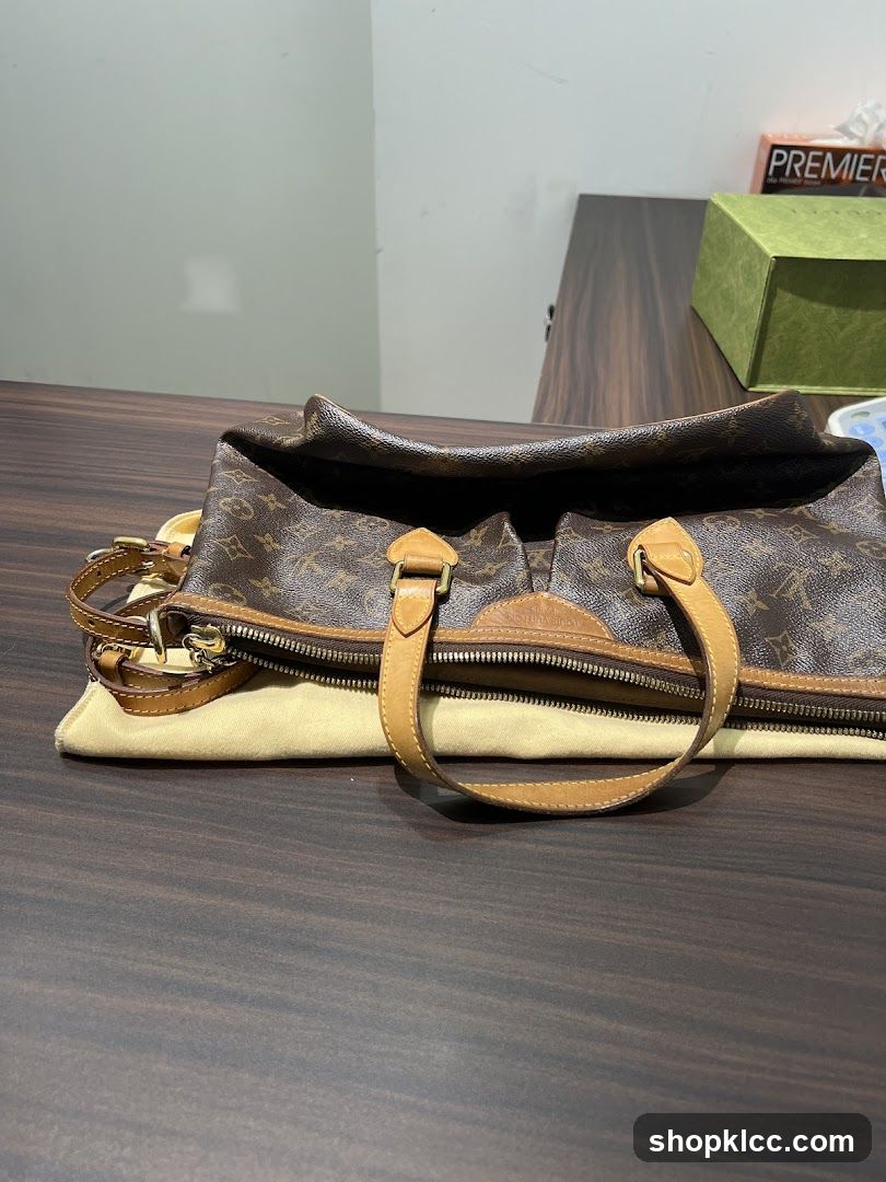 Louis Vuitton Handbag on Table