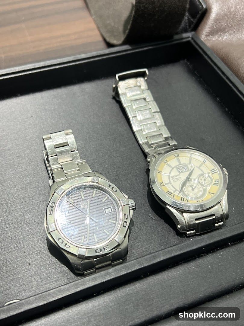Two Watches in a Display Case