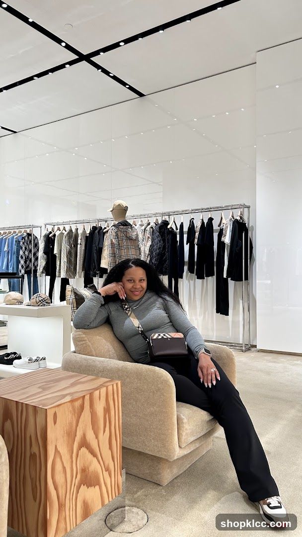 Woman in a clothing store interior