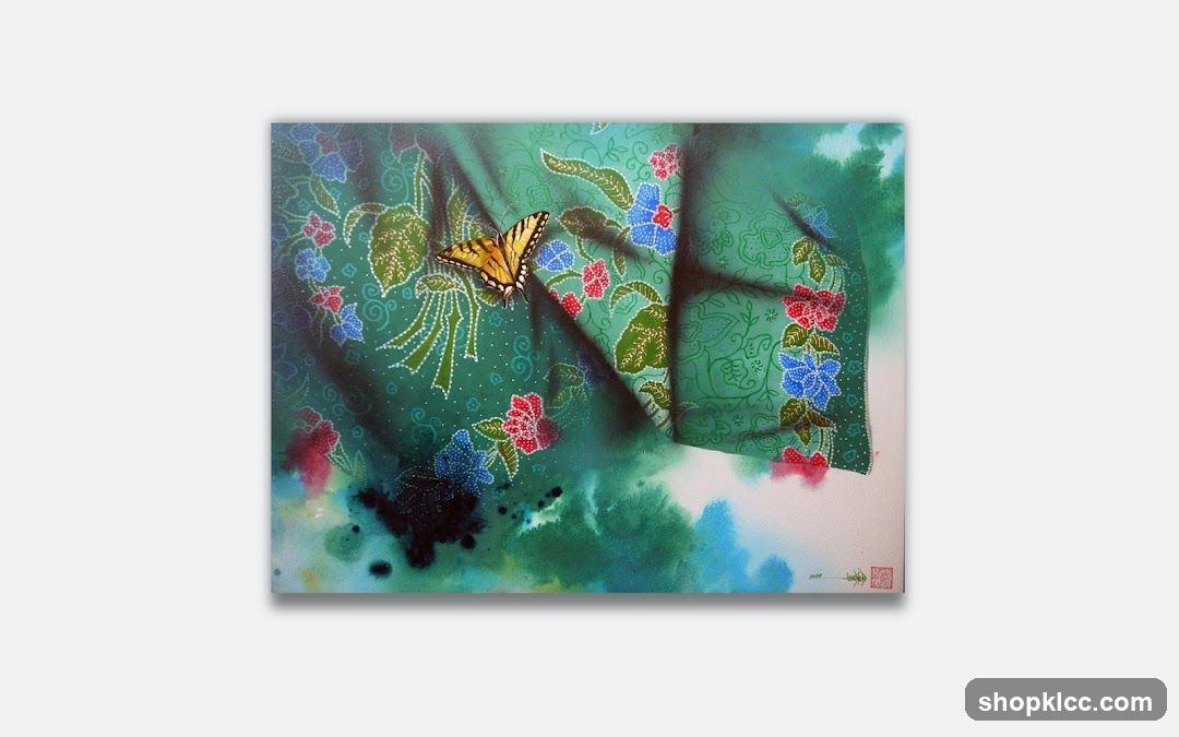 Painting of a butterfly on green fabric